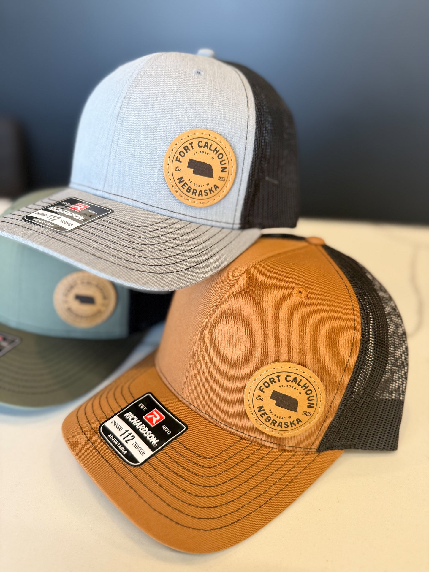 Fort Calhoun, Nebraska Coordinates Leather Patch Trucker Hat