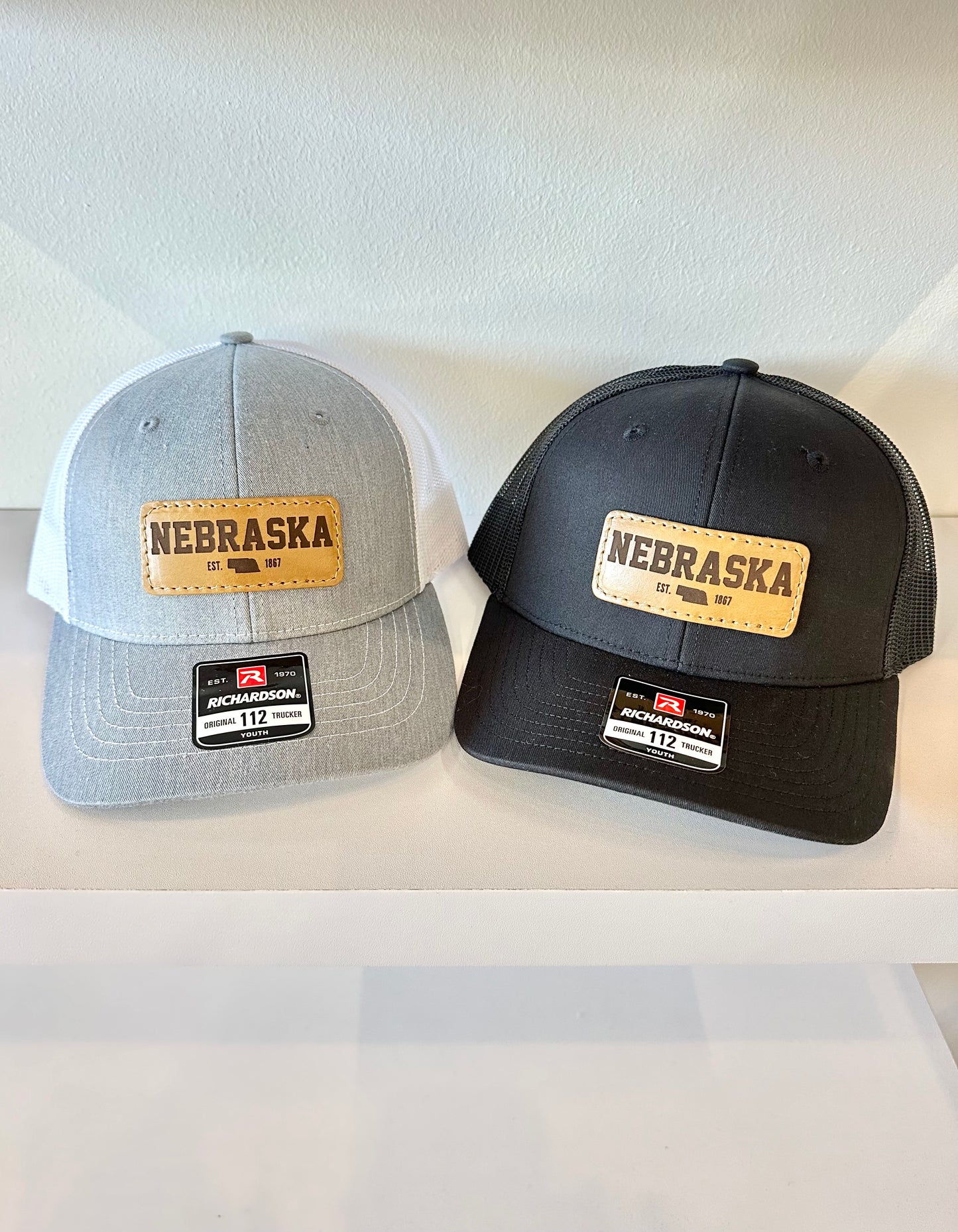 YOUTH Nebraska Est. 1867 Leather Patch Trucker Hat