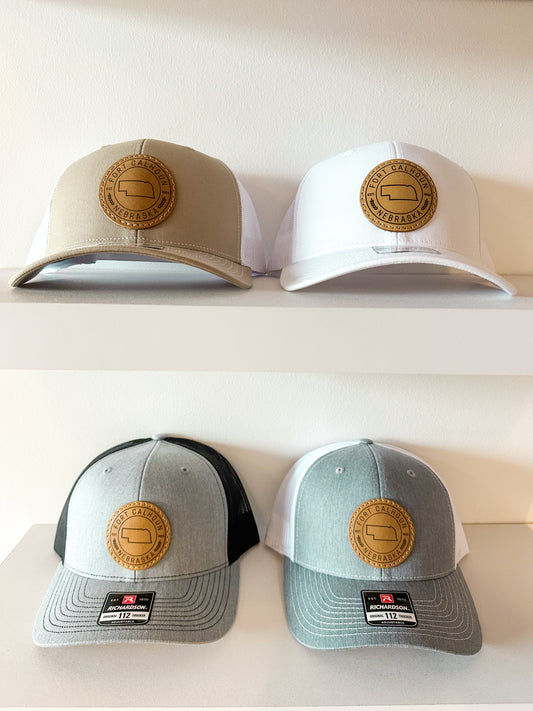 Fort Calhoun, Nebraska Circle Leather Patch Trucker Hat