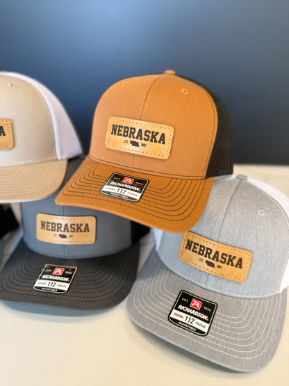 Nebraska Leather Patch Trucker Hat