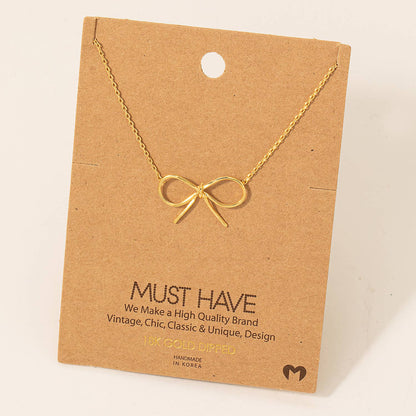 Gold Dipped Bow Pendant Necklace