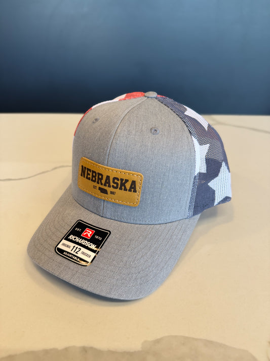 Nebraska American Flag Leather Patch Trucker Hat
