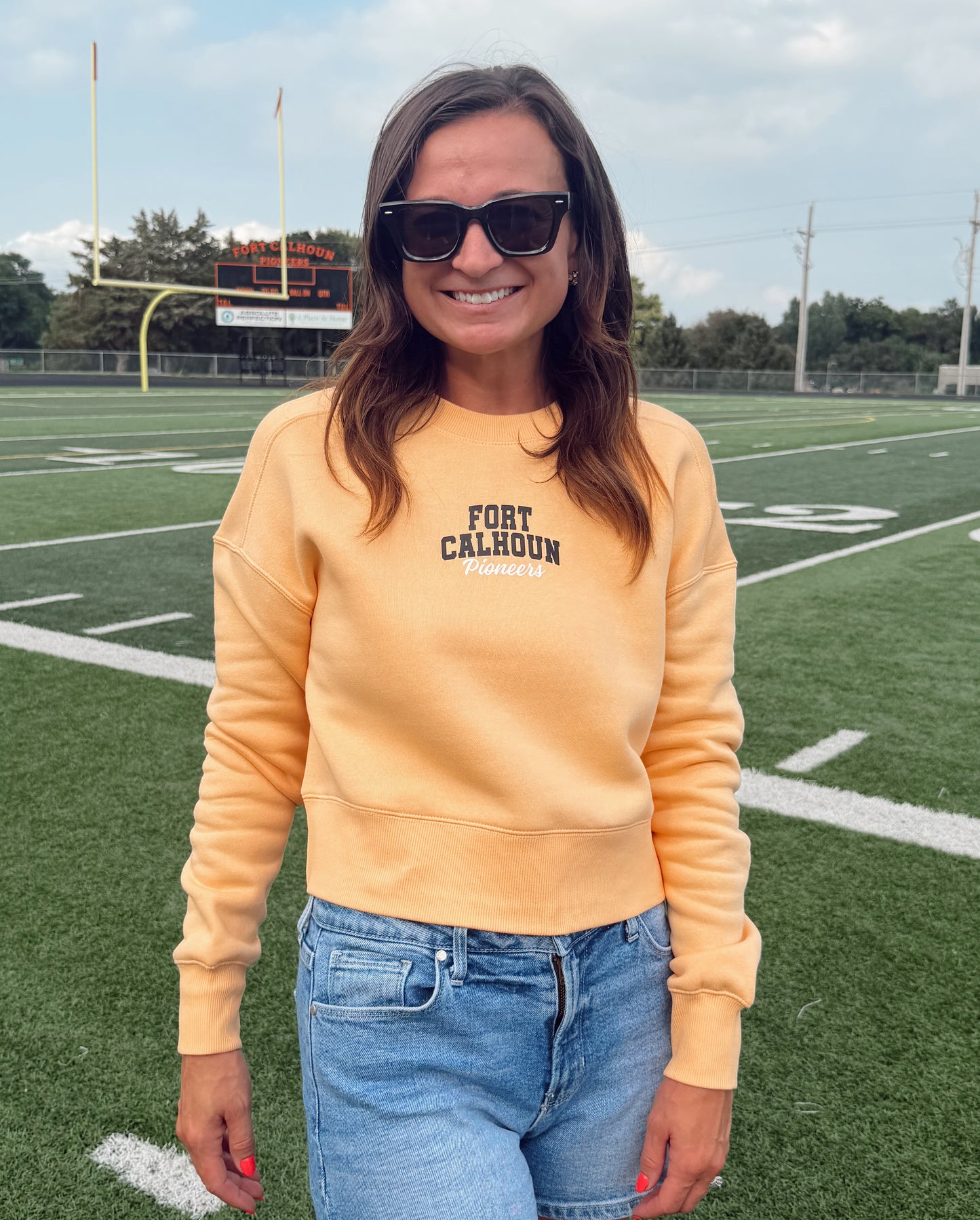 Fort Calhoun Pioneers Women's Light Orange Crop Sweatshirt