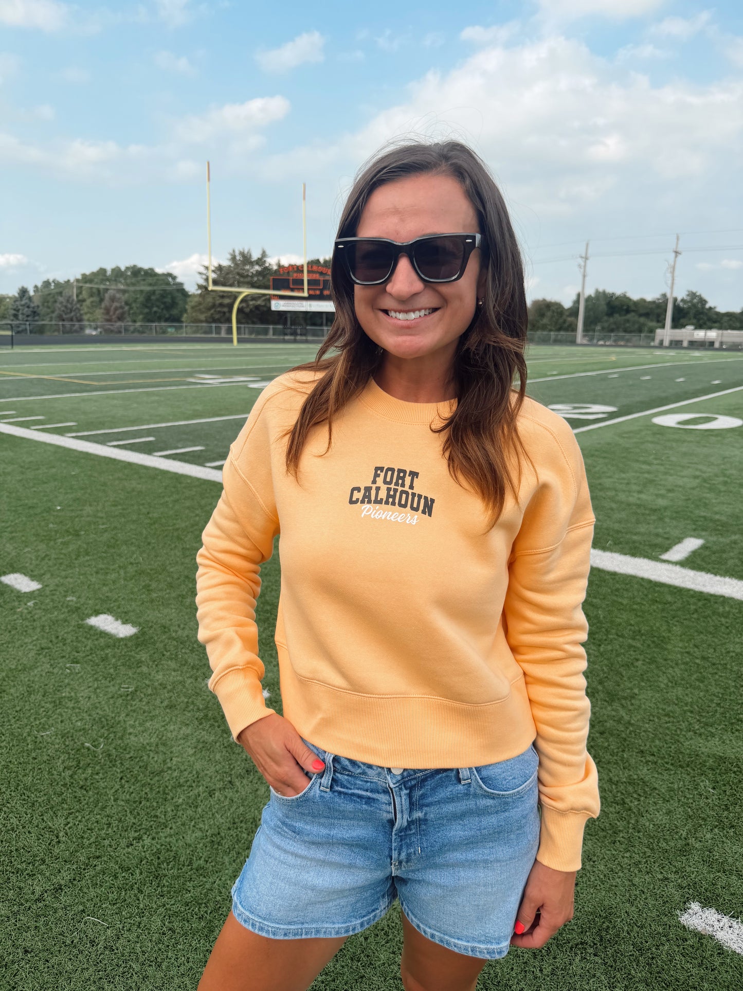 Fort Calhoun Pioneers Women's Light Orange Crop Sweatshirt