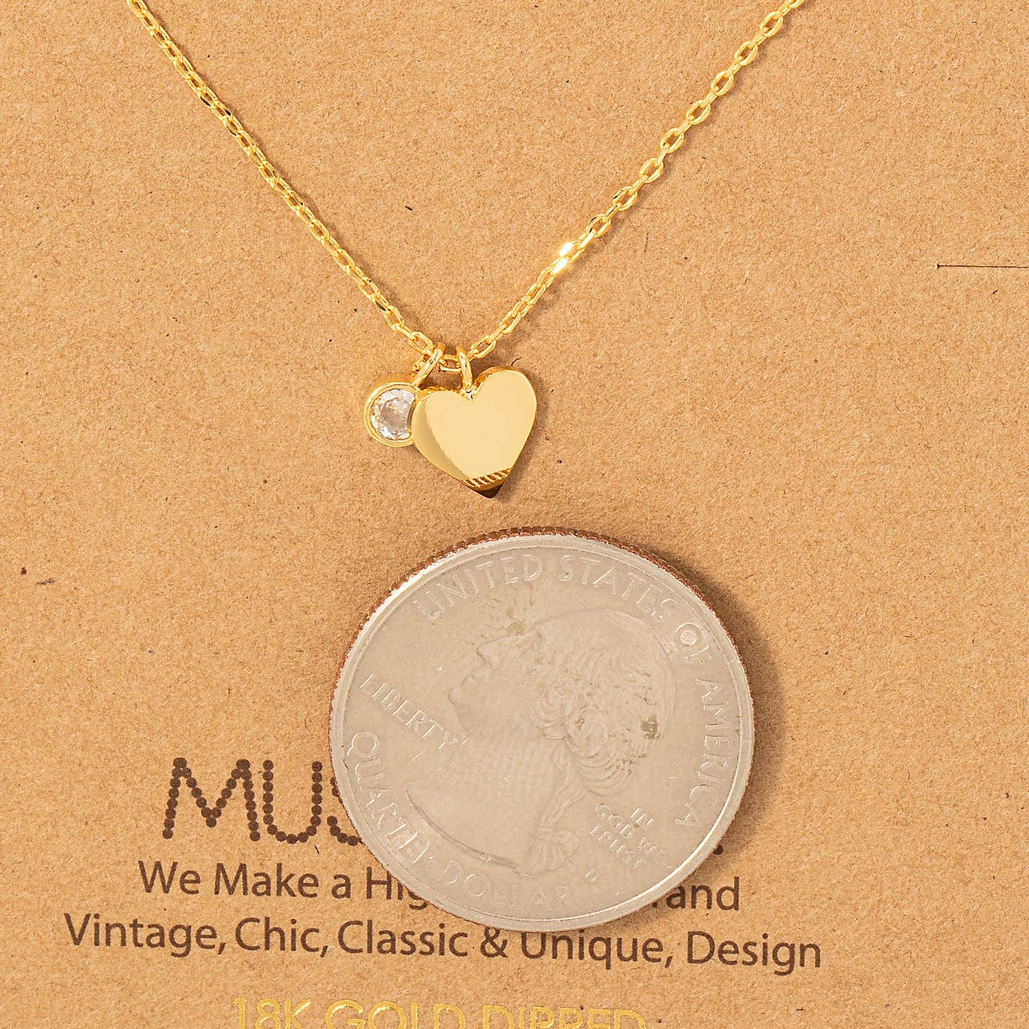 Gold Dipped Heart And Charm Necklace