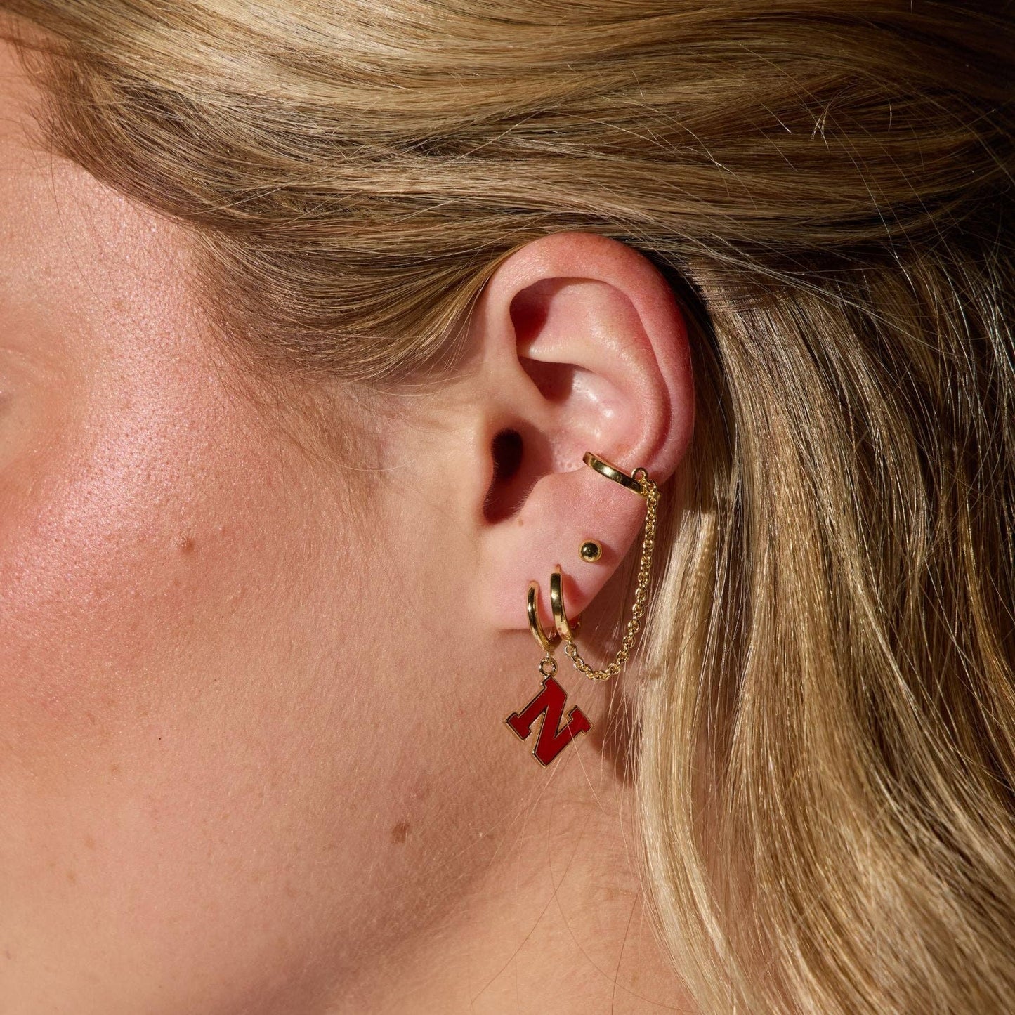 University of Nebraska N Enamel Huggies Earrings