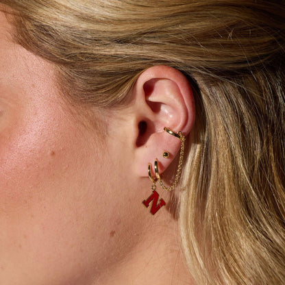 University of Nebraska N Enamel Huggies Earrings